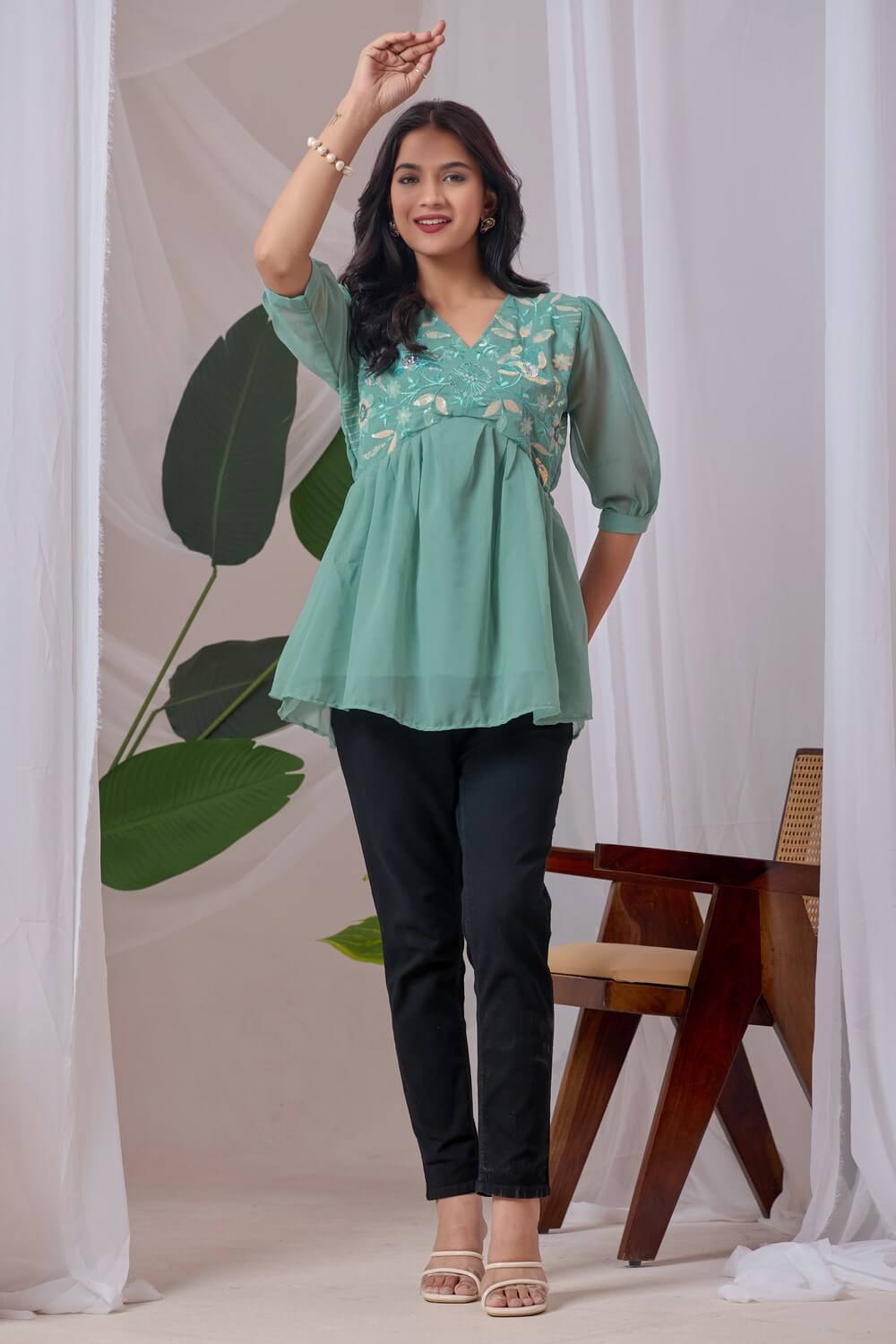 Party wear light green embroidered georgette tunic