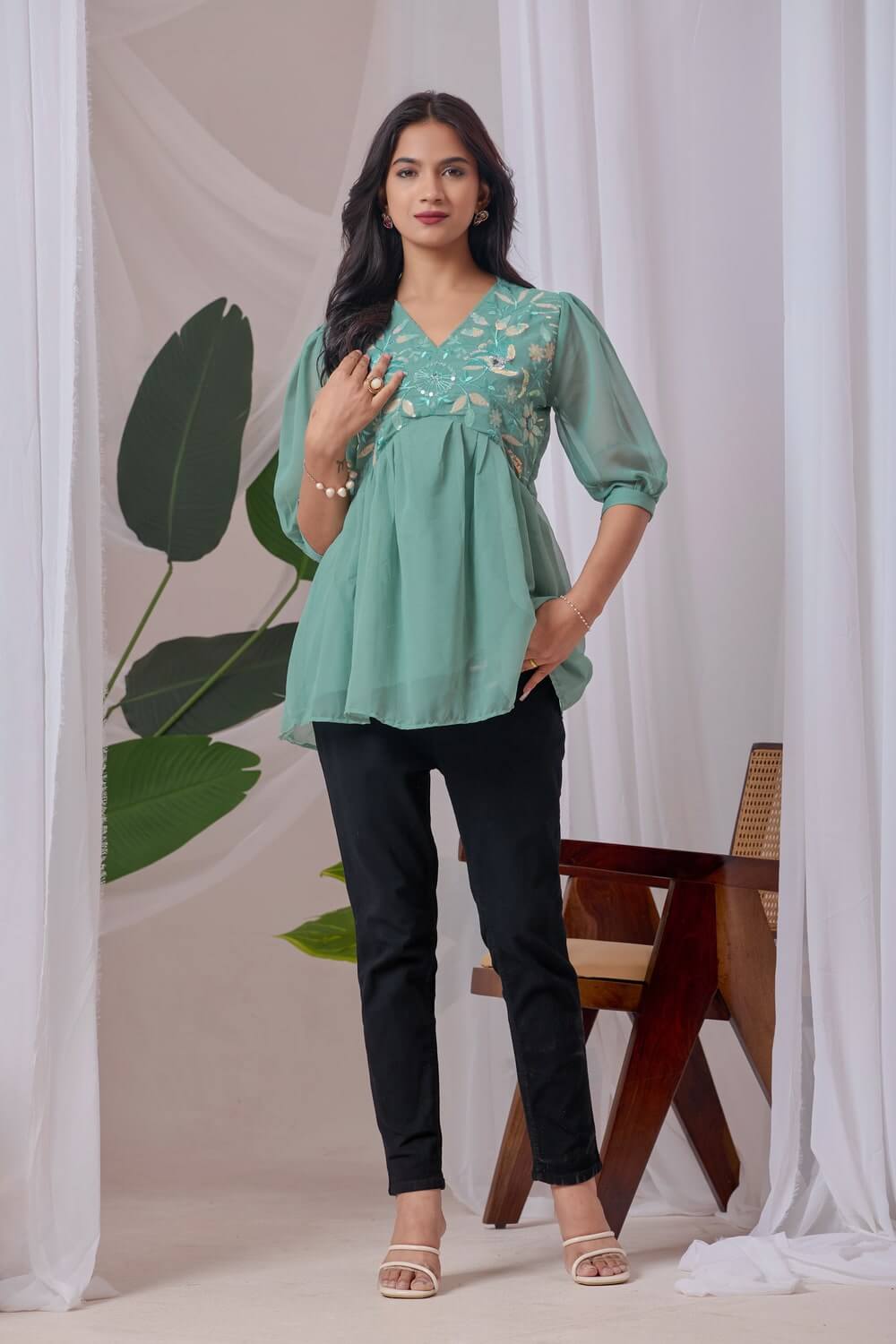 Soft light green embroidered top casual and party wear
