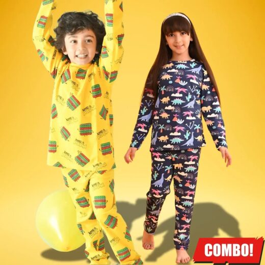 Kids wearing yellow graphic-print and navy dinosaur-print pyjama sets against a yellow background.